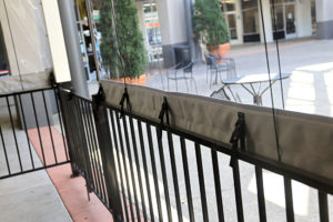 Restaurant window panel attachment