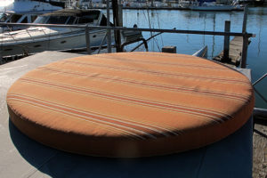 orange striped round cushion
