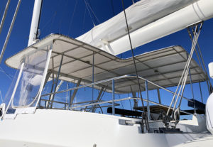 large white laced bimini top sailboat