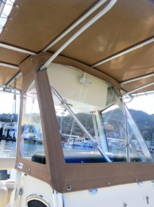 tan bimini enclosure powerboat