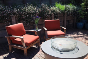 Wooden chairs with red cushions