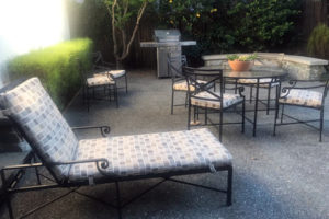 Chaise cushion with beige and gray sunbrella