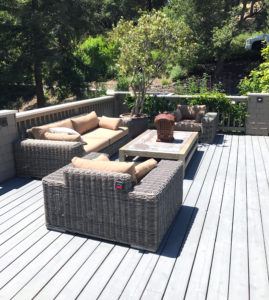 Deck with beige cushions on patio set