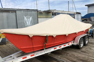 tan boat cover with ties