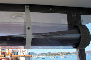 Enclosure panel roll up window