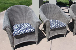 Wicker seat cushions with piping