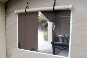 Roll up enclosure window