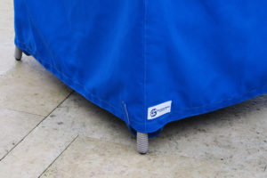 Blue sunbrella patio chair cover close up