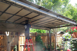 Fabric canopy being installed