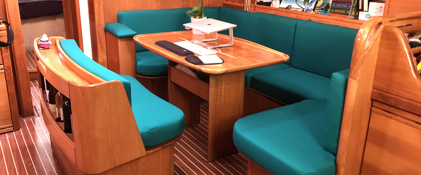 https://www.thecanvasworks.com/wp-content/uploads/2021/01/Full-boat-Salon-interior-cushions-teal.jpg