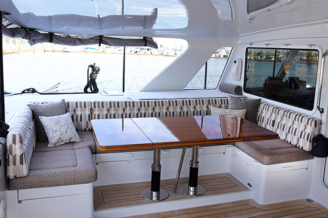 https://www.thecanvasworks.com/wp-content/uploads/2021/02/wrap-around-dining-boat-seating.jpg